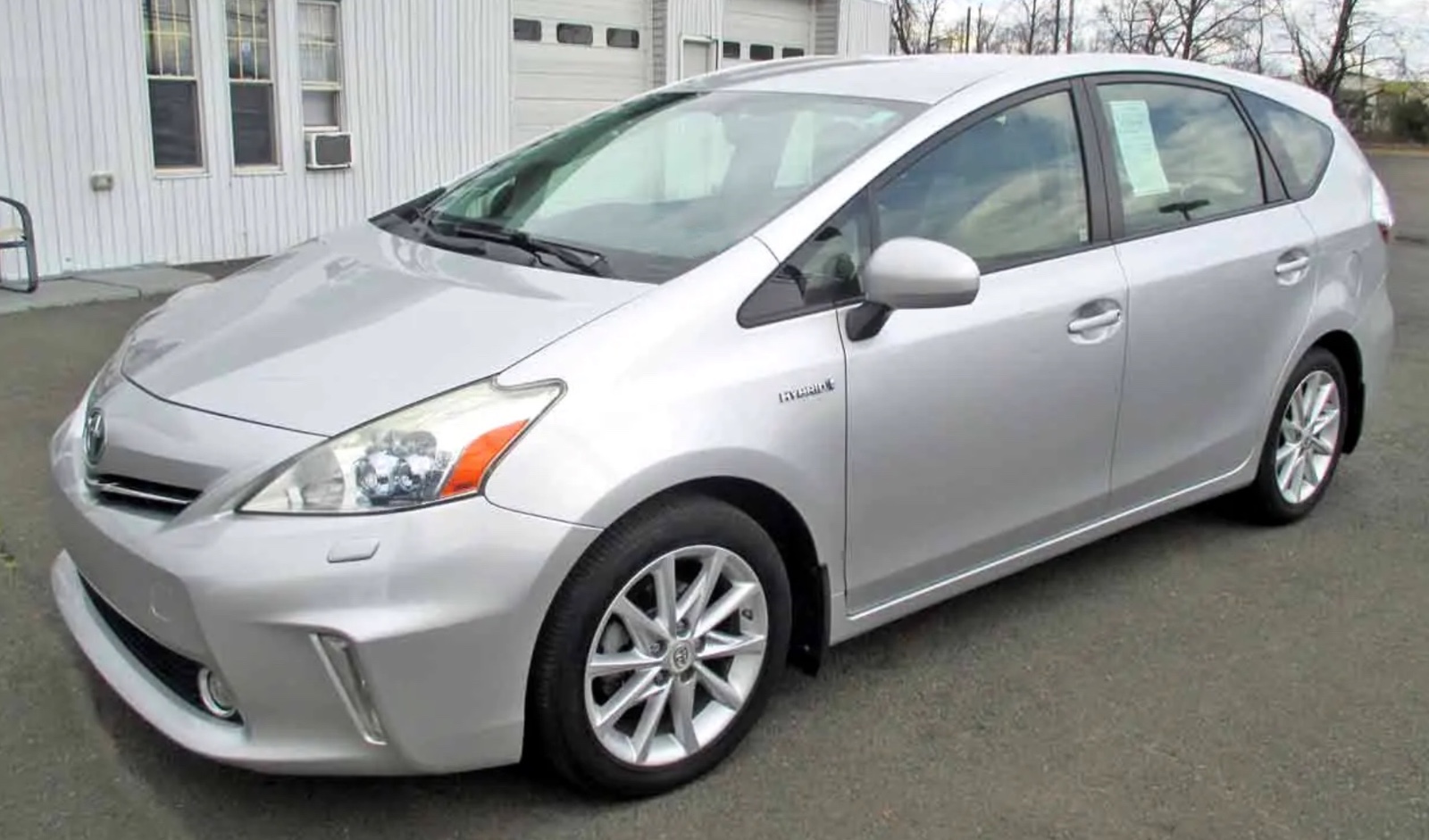 2012 Toyota Prius V gasoline-electric hybrid sedan, priced at 11,500