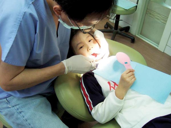 陳信江牙醫博士