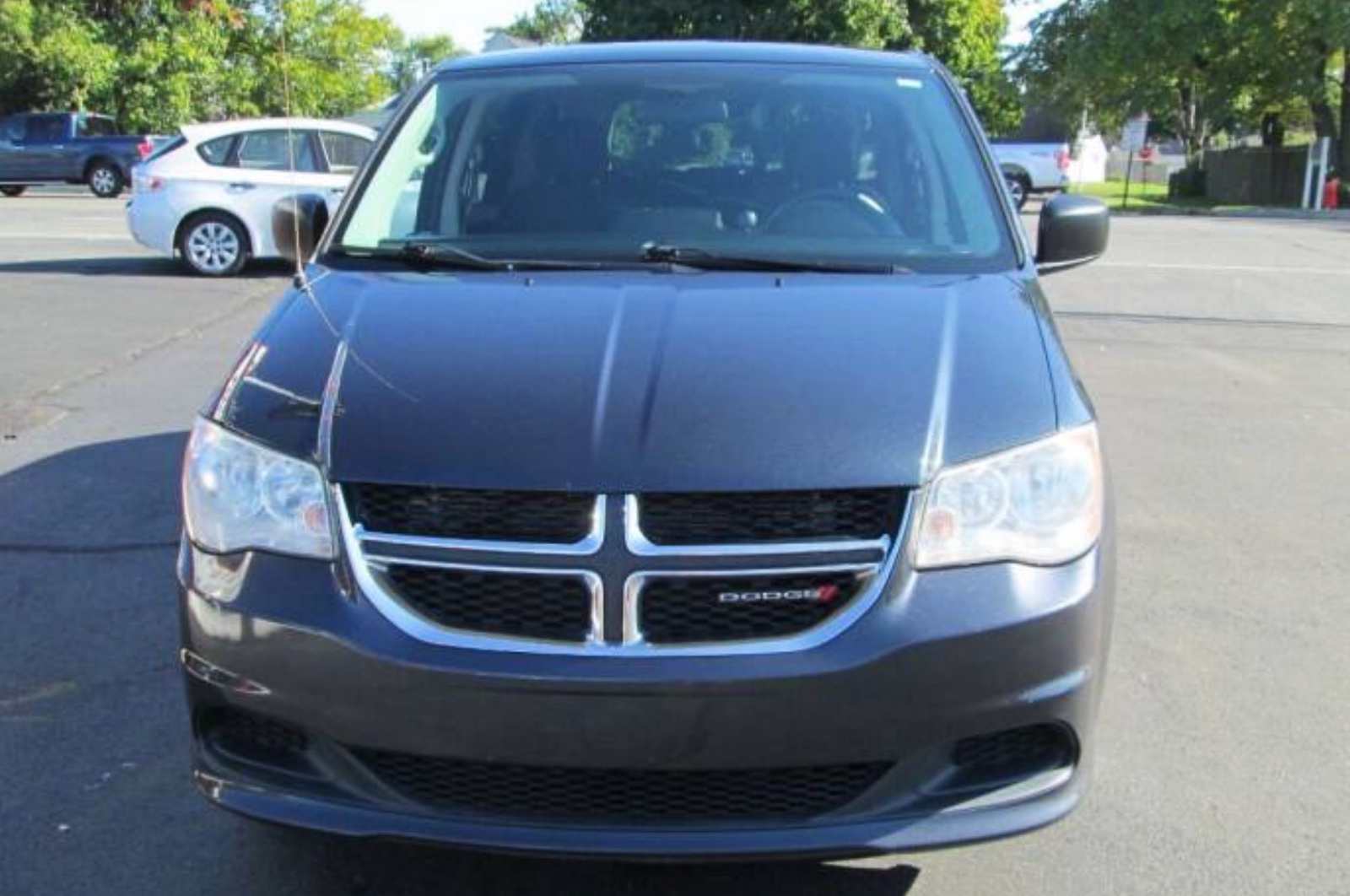 2014 Dodge Grand Caravan, seven seats in the United States, priced at 9,995