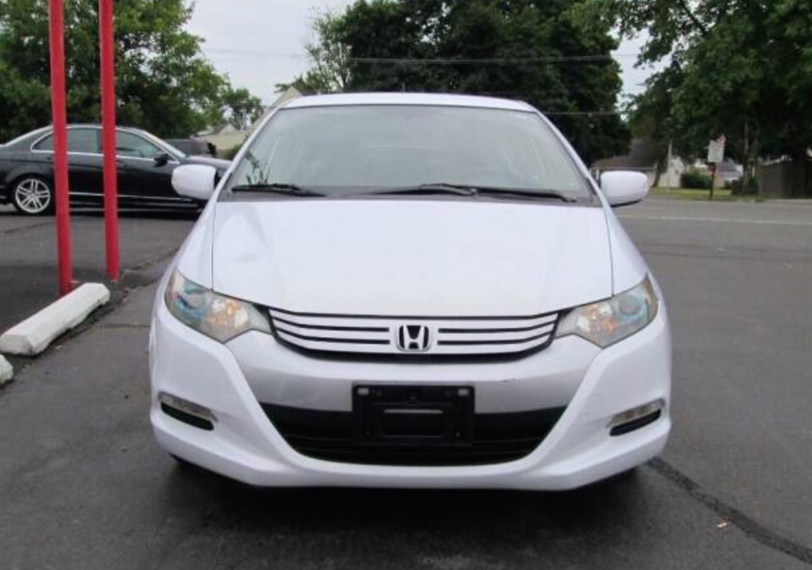 2010 Honda Insight Honda gasoline-electric hybrid sedan, priced at 11,995