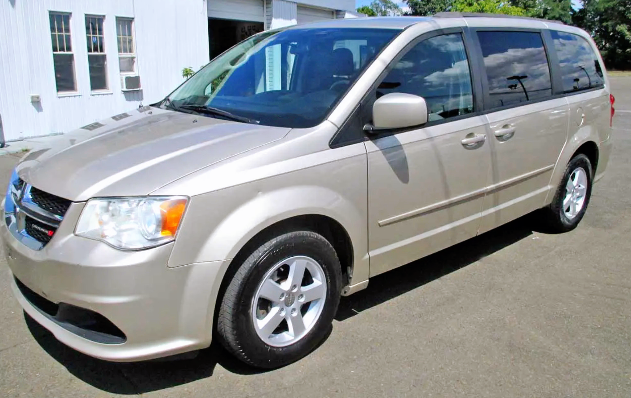 2013 Dodge Grand Caravan has seven seats and is priced at 9,900