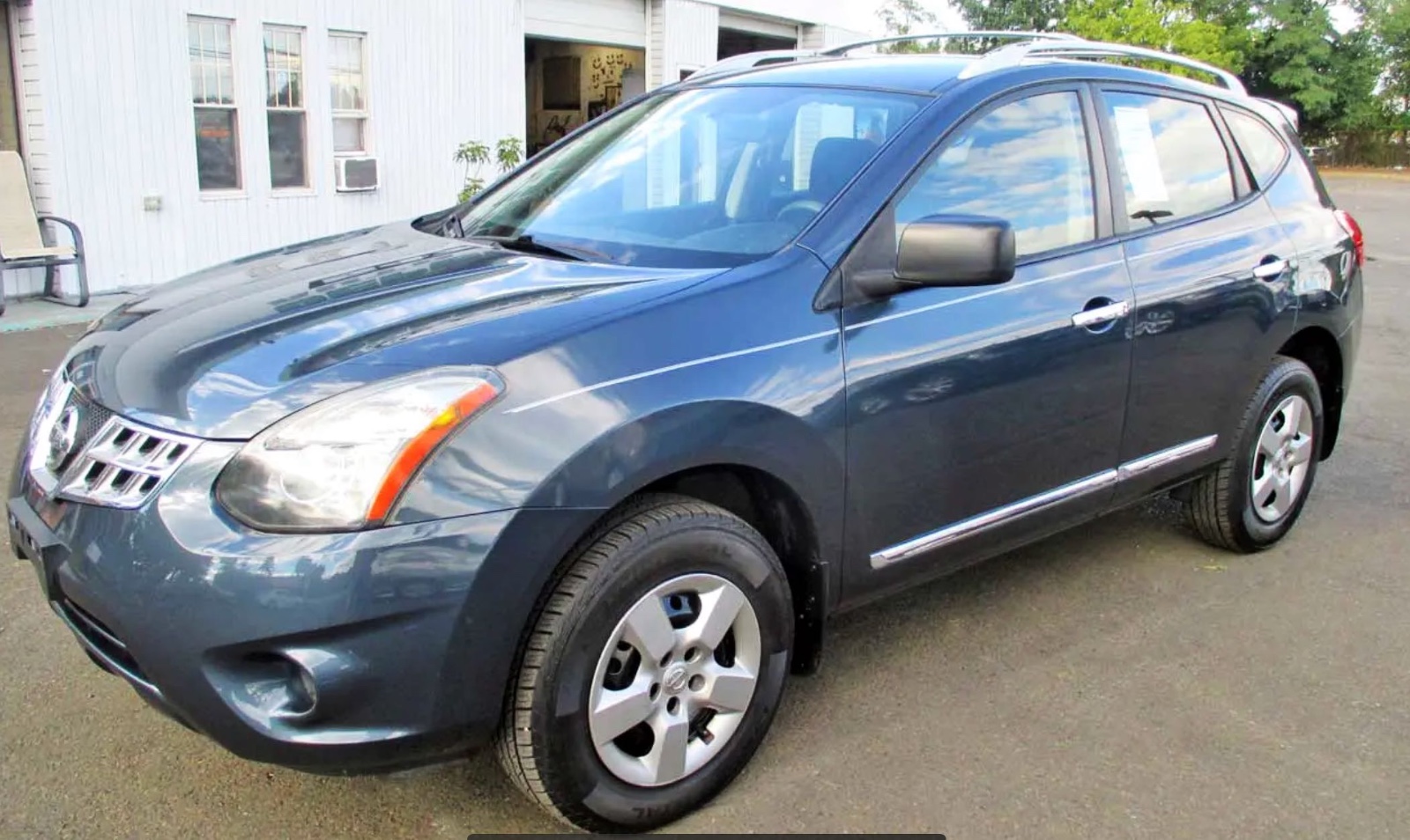 2014 Nissan Rogue five-seat SUV priced at 8,900