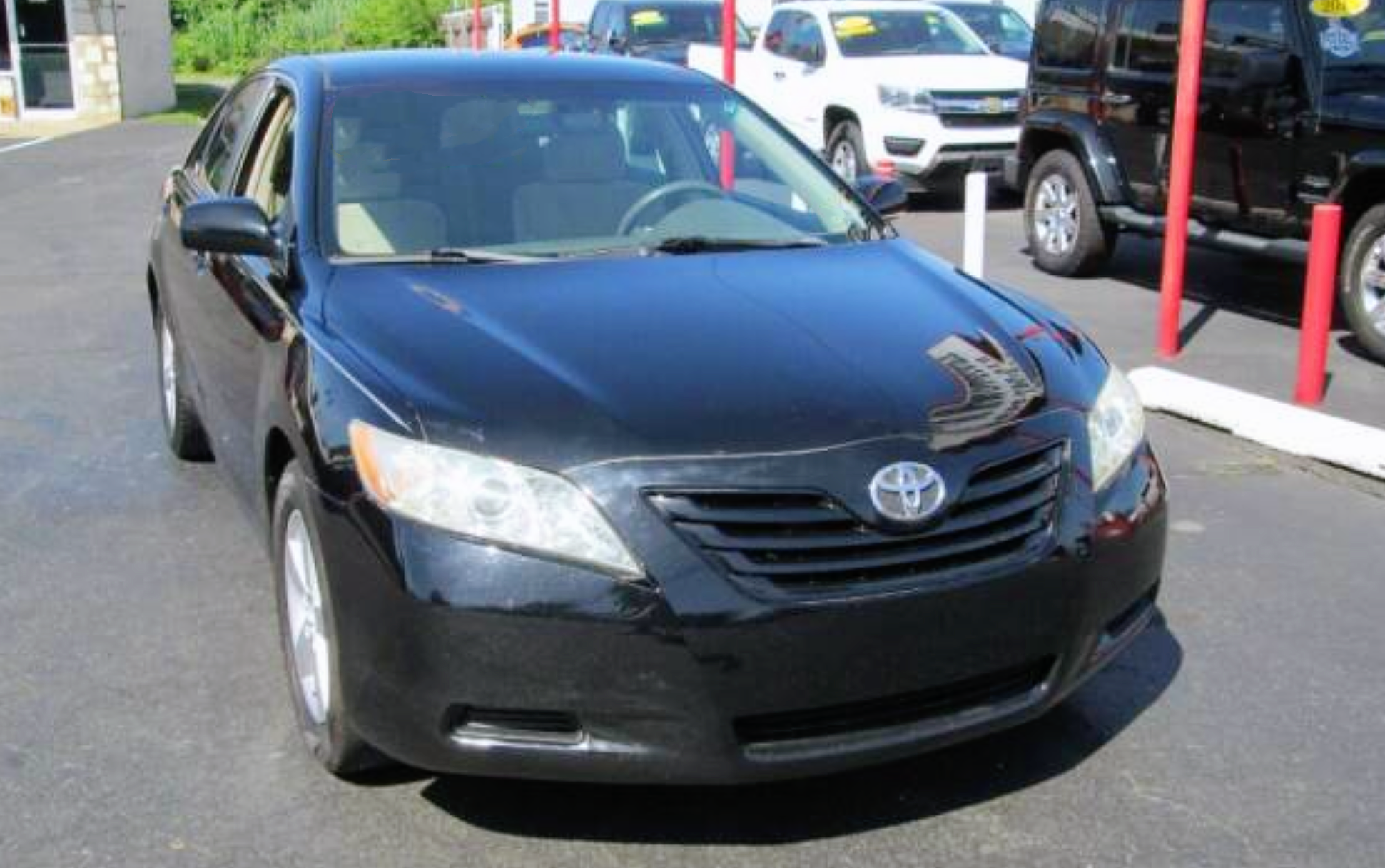 2009 Toyota Camry LE Camry sedan, priced at 10,995