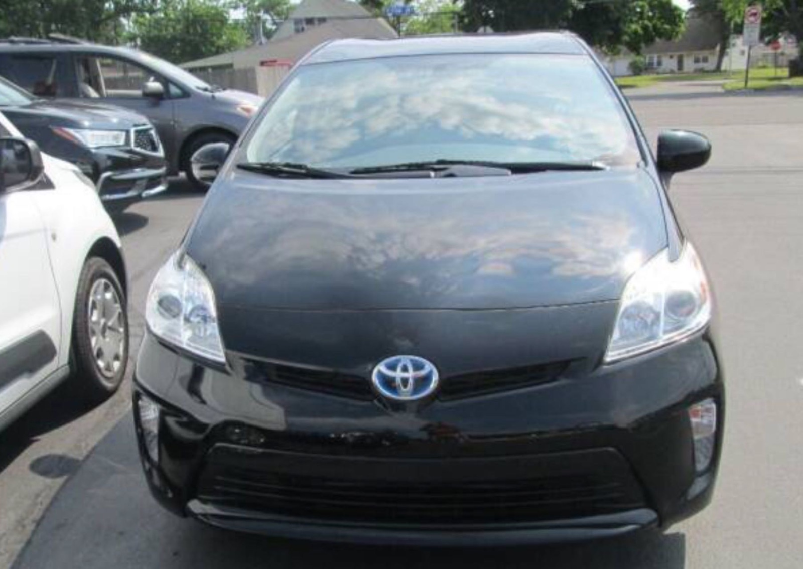 2015 Toyota Prius gasoline-electric hybrid sedan, priced at 16,495
