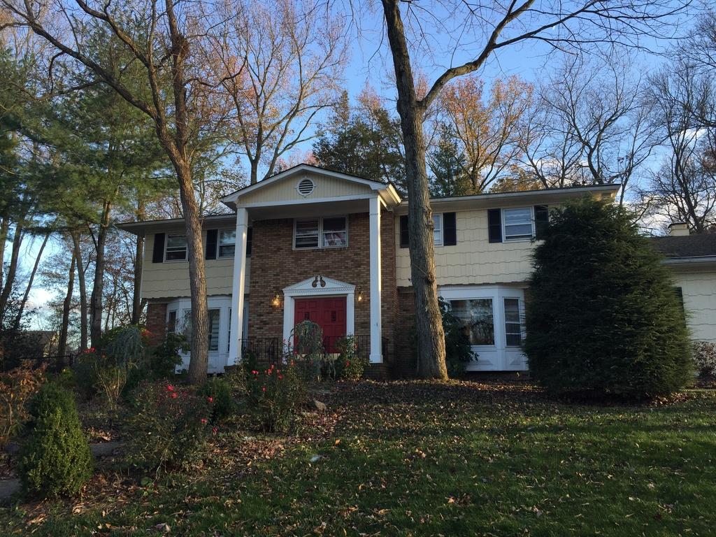 Magnificent Center Colonial Sits on Half an Acres